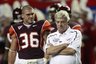 Virginia Tech coach Frank Beamer watches as his team loosens up prior to an NCAA college football game against Alabama at the Georgia Dome in Atlanta, Saturday, Sept. 5, 2009. At left is linebacker Jake Johnson. (AP Photo/Dave Martin)