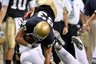 Notre Dame tight end Mike Ragone is upended by Washington State's Myron Beck  in the first half of an NCAA college football game Saturday, Oct. 31, 2009  in San Antonio, Texas.   (AP Photo/Bahram Mark Sobhani)