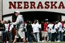 This photo made April 17, 2010, shows Nebraska head coach Bo Pelini crossing the playing field during the annual Red-White spring college football game, in Lincoln, Neb. That painfully close loss to Texas in the Big 12 championship game and convincing bowl win over Arizona have Bo Pelini believing Nebraska is on the cusp of achieving the thing that drives him every day _ winning a championship. After the 33-0 Holiday Bowl victory, Pelini shouted "Nebraska's back and we're here to stay." (AP Photo/Nati Harnik)