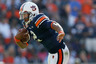 AUBURN AL - OCTOBER 23:  Quarterback Cameron Newton #2 of the Auburn Tigers is tackled Ryan Baker #22 of the LSU Tigers at Jordan-Hare Stadium on October 23 2010 in Auburn Alabama.  (Photo by Kevin C. Cox/Getty Images)