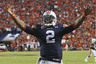 AUBURN - OCTOBER 16:  Quarterback Cam Newton #2 of the Auburn Tigers celebrates during the game against the Arkansas Razorbacks at Jordan-Hare Stadium on October 16 2010 in Auburn Alabama.  The Tigers beat the Razorbacks 65-43.  (Photo by Mike Zarrilli/Getty Images)