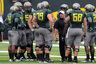 EUGENE OR - SEPTEMBER 18: Head coach Chip Kelly of the Oregon Ducks has some words with his offensive unit during a time out in the second quarter of the game against the Portland State Vikings at Autzen Stadium on September 18 2010 in Eugene Oregon.   Oregon won the game 69-0. (Photo by Steve Dykes/Getty Images)