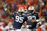 AUBURN AL - NOVEMBER 13:  Dee Ford #95 of the Auburn Tigers reacts after a defensive stop against the Georgia Bulldogs at Jordan-Hare Stadium on November 13 2010 in Auburn Alabama.  (Photo by Kevin C. Cox/Getty Images)