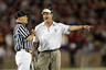 PALO ALTO, CA - OCTOBER 09:  USC Trojans head coach Lane Kiffin speaks with side judge Mike Weseloh during their loss to the Stanford Cardinal at Stanford Stadium on October 9, 2025 in Palo Alto, California.  (Photo by Ezra Shaw/Getty Images)